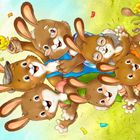 Text: "Prima, jetzt sind alle da. Dann kann es mit den Vorbereitungen fürs Osterfest losgehen. Hilfst du mit? Klatsch in die Hände." Illustration: Fröhliche Hasenfamilie in bunten Kleidern auf grünem Gras. Bunte Konfetti. Ein Küken in der Mitte.