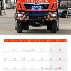 "FEUERWEHR" auf einem roten Feuerwehrfahrzeug. Darunter ein Kalender für Juni 2027 mit hervorgehobenen Feiertagen.