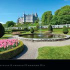 "Dunrobin Castle", Kalenderblatt für Mai 2027. Schloss mit Türmen, gepflegter Garten mit Springbrunnen und blühenden Tulpen.