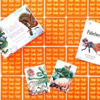 Zwei Schachteln und Karten mit "Fabelwesen - Ein fantastisches Memo-Spiel", vor orangefarbenem Muster mit Fabelwesen.