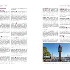 Praktische Infos, Essen & Trinken, Einkaufsmöglichkeiten. Foto einer Statue mit Schiffen im Hintergrund.