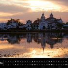 Text: "Andalusien 06", "Pilgerkirche 'Nuestra Señora del Rocío', Huelva". 

Szene: Kirche bei Sonnenuntergang, Spiegelung im Wasser.