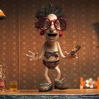 Eine Figur in bunter Unterwäsche, großer roter Brille und mit Zigarre, steht auf einem Tisch mit Flasche und Glas.