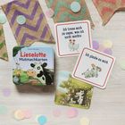 "Lieselotte Mutmachkarten", "Ich traue mich zu sagen, was ich nicht möchte", "Ich glaube an mich." Bunte Karten und Deko.