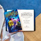 Buchtitel "The Last Immortals: Rise of the Rebels". Ein Axolotl schwimmt vor einem großen Fisch in bläulicher Umgebung.