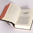 Das Buch zeigt den Titel "Ladies and Gentlemen: Liza Minnelli" von Michael Feinstein. Es ist aufgeschlagen mit sichtbarem Inhaltsverzeichnis.