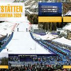 Sportstätten Mailand Cortina 2026. Wintersportumgebung mit Skipiste, Tribünen, Zuschauern und Infos zu olympischen Austragungsorten.