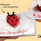 Text: "Aufklappen und entdecken; ein Marienkäfer; Oetinger." Eine Hand hält ein Buch mit einem aufklappbaren Marienkäfer.