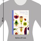 „Seeds: Nature's Intrepid Miracles“. Abbildung von Samen in verschiedenen Formen und Farben. Maße: 18,5 b x 27 h cm.