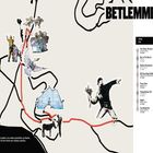 "BETLEMME" oben rechts; darunter eine Liste von Arbeiten: "The Flower Thrower", "Boy at The Beach", "Donkey Documents". Illustrationen zeigen Kunstwerke entlang einer Route auf einer stilisierten Karte.