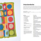"Intarsiendecke" steht oben. Beschreibung und Anleitungen zu einer bunten gestrickten Decke mit großen Kreisen.