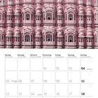 Kalenderseite für Juli 2027 mit einem Foto eines rosa Palastes und blauer Himmel.