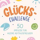 Text: „GLÜCKS-CHALLENGE“, „50 Impulse für kleine Alltagsfreuden“. Bunte Symbole wie Hufeisen, Sonne, Kleeblatt.