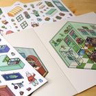 Ein Stickerbogen mit Küchengeräten und ein Bild von Cartoon-Tieren in einer grünen Küche.