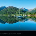 Loch Leven in den Highlands. Kalender mit Daten für Juni 2027. Ruhiger See mit Segelbooten und bewaldeten Bergen im Hintergrund.