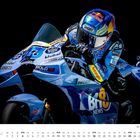 Kalender-Unterseite zeigt Juli. Oben ein Motorradfahrer mit vielen Logos auf der blauen Rennkleidung und dem Motorrad.