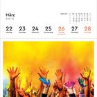 Kalenderseite: März KW 12, Tage 22-28. Bild zeigt viele Hände mit buntem Pulver in der Luft. Feiertag: Karfreitag am 26.