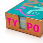 Bunter Karton mit "TYPO", "27", "Your Daily Dose of Type". Sichtbarer Inhalt seitlich.