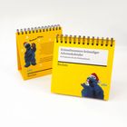 "Krümelmonsters krümeliger Adventskalender. 24 Postkarten für die Weihnachtszeit." Vorne ist eine Illustration des Krümelmonsters.