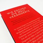 "Wie Kochen die Welt veränderte" lautet der Titel auf einem roten Hintergrund mit einem beschreibenden Text darunter.