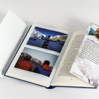 LUKAS WÖRLE, geboren 1993, leidenschaftlicher Entdecker, Bergsteiger, Guide. Foto zeigt zwei Berglandschaften. Buch mit Lesezeichen.