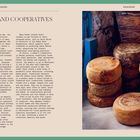 Der Text beschreibt Inselgenossenschaften und ihre Bedeutung für Kultur und Wirtschaft. Rechts sind Käselaibe gestapelt.