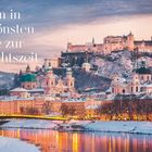 "Reisen in die schönsten Städte zur Weihnachtszeit." Beschreibung von Salzburg im Winter mit verschneiter Landschaft.