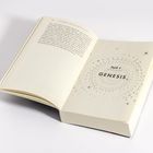 Auf einer Seite steht "Teil I GENESIS" mit einem Muster aus Kreisen und Punkten. Links ist Text zu lesen.