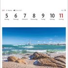 Kalenderseite: Juli, Woche 27, 21.6. - 22.7., mit Datumsangaben. Küstenlandschaft mit Leuchttürmen und Felsen am Meer.