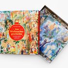 Puzzle-Schachtel mit Text: "Die Welt von Eine Weihnachtsgeschichte" und Illustration von Weihnachtsmotiven.