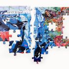 Zwei Puzzle-Hälften zeigen Meeres- und Arktisszenen mit Orcas, Pinguinen, Fischen und farbigen Korallen.