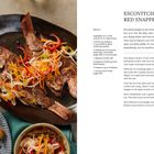 "ESCOVITCH WHOLE RED SNAPPER" und Rezept. Links ein gebratener Fisch auf einem Teller, garniert mit buntem Gemüse.