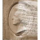 „A FRED. CHOPIN“, Notenblatt „Andante con moto, Ballade“. Porträt auf einer Medaille, Datumsleiste unten.