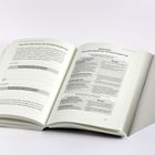 Zwei Buchseiten mit den Titeln "Fazit: Das dritte Gesetz der Verhaltensänderung" und "Spickzettel: Das dritte Gesetz der Verhaltensänderung".