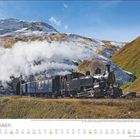 Ein Zug der Dampfbahn Furka-Bergstrecke fährt durch eine verschneite Berglandschaft. Unten: Kalenderdaten für September.