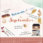 „Mach's dir schön im September“ steht im Zentrum, begleitet von herbstlichen Illustrationen wie Blättern und Gebäck.
