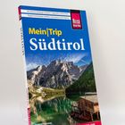 "Reise Know-How: Mein|Trip Südtirol" zeigt Berge, See und Hütte, Text von Sven Eisermann.