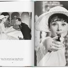 Text: "In one of the 'improvised' scenes in Paris When It Sizzles, Audrey points her pistol at Bill... and lights his cigarette."

Links eine Frau in Hut zündet mit Pistole Zigarette an. Rechts Nahaufnahme der Frau mit Pistole.