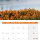 Kalender für September 2027; zeigt Daten, Feiertage und eine Landschaft mit Bergen, Wald und See im Nebel.