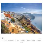 9. Oia, Santorini. Häuser an einem Abhang, Blick aufs Meer, weiß-blaue Architektur, klares Wetter.