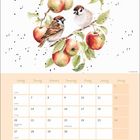 Kalender für September mit hellen Farben, illustriert mit zwei Vögeln und Äpfeln auf einem Ast.