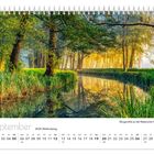 Kalenderseite: "September, 20.09. Weltkindertag". Bildtext: "Morgenstille an der Radduscher Kahnfahrt". Landschaft mit Bäumen und Fluss.