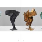 156, 157, Windhose I–VII, 2016. Vier abstrakte Skulpturen in verschiedenen Metalltönen stehen nebeneinander.