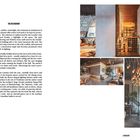 "The Restaurant" beschreibt ein stilvolles, beleuchtetes Restaurant mit rustikalen und modernen Designelementen sowie kunstvoller Beleuchtung.
