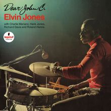 Text: "Dear John C.", "Elvin Jones", "with Charlie Mariano, Hank Jones, Richard Davis and Roland Hanna", Logo: "impulse!" Ein Mann spielt Schlagzeug.
