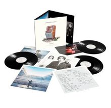 Text: "Stereophonics" und "Decade in the Sun." Eine Sammlung von Schallplatten, Fotos und Notizen auf weißem Hintergrund.