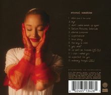 Text: 

eternal sunshine
1. intro (end of the world)
2. bye
3. don't wanna break up again
4. Saturn Returns Interlude
5. eternal sunshine
6. supernatural
7. true story
8. the boy is mine
9. yes, and?
10. we can't be friends (wait for your love)
11. i wish i hated you
12. imperfect for you
13. ordinary things (feat nona)

Ein lächelndes Mädchen mit roten Handschuhen hält ihr Gesicht.
