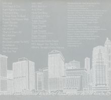Disc One und Disc Two mit Songtiteln. Produziert von The Beastie Boys. Skyline von New York als Illustration.