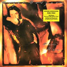 "Roger Hodgson Hai Hai" steht oben. Ein gelbes Label beschreibt 180 Gramm Vinyl, Abbey Road Studios. Hintergrund zeigt ein abstraktes, warmes Kunstwerk.