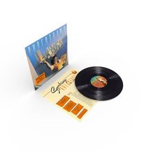 "Supertramp. Breakfast in America" auf einem Albumcover, Beilegeblatt und Vinyl-Schallplatte zeigen orange und blaue Töne.